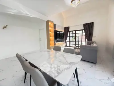 Spacious modern living room with elegant marble flooring and stylish furniture