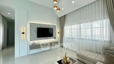 Luxurious modern living room with elegant decor and large windows