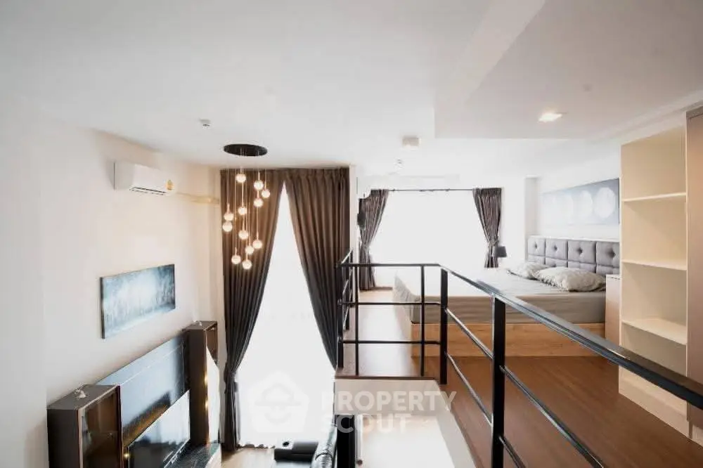 Modern loft apartment with stylish mezzanine bedroom and elegant lighting