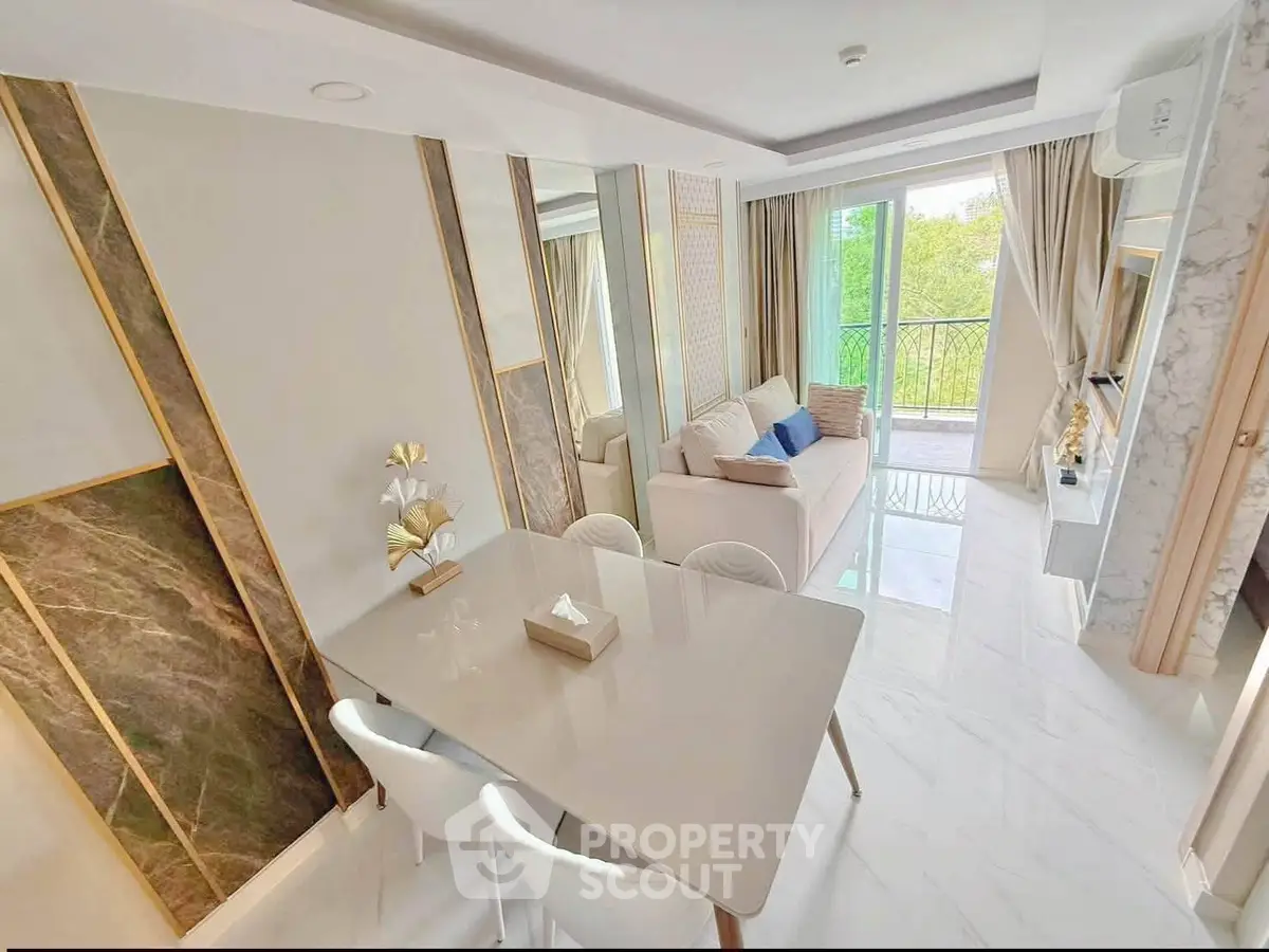 Luxurious modern living room with elegant decor and balcony view