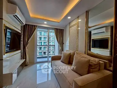 Luxurious living room with modern decor and balcony view in upscale apartment.