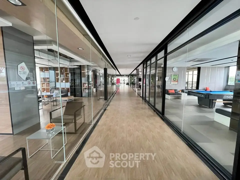 Modern corridor with glass walls and stylish interior design in a commercial building