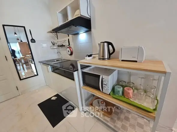 Modern kitchen with sleek appliances and minimalist design