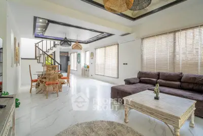 Spacious modern living room with elegant decor and natural light