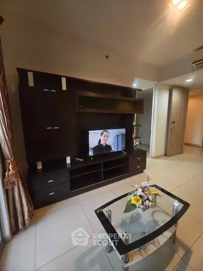 Modern living room with sleek entertainment unit and stylish decor