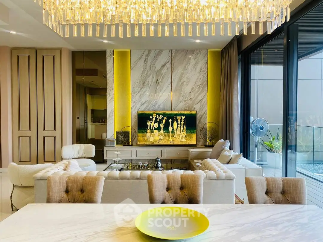 Luxurious living room with elegant chandelier and modern decor