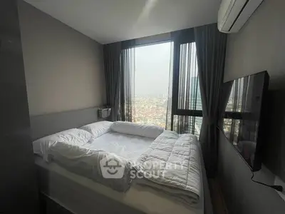 Modern bedroom with large window offering stunning city view, featuring cozy bed and sleek air conditioning unit.