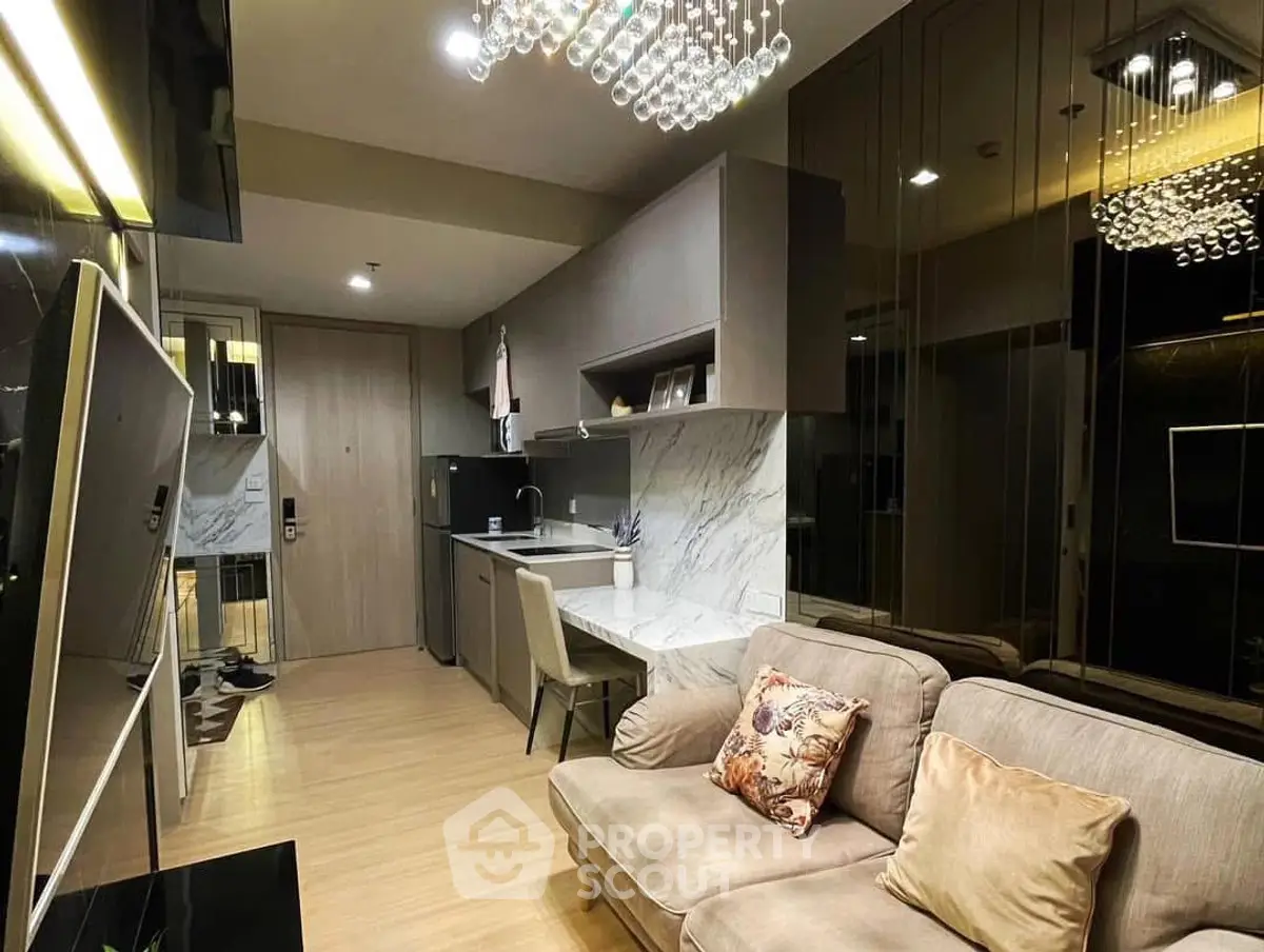 Modern living room with chic decor and open kitchen layout