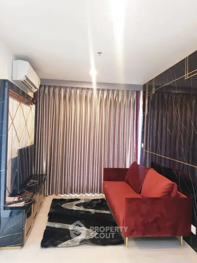 Stylish living room with modern decor and red sofa in a chic apartment