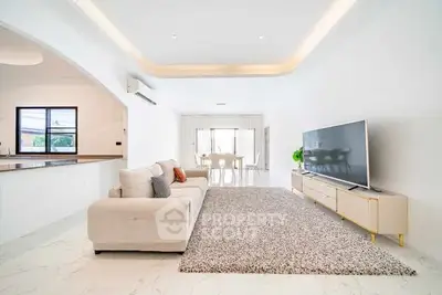 Spacious modern living room with elegant decor and open layout