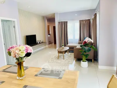 Spacious modern living room with elegant decor and natural light