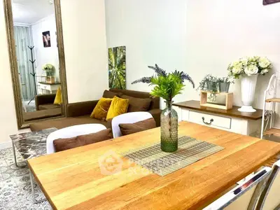 Charming living room with stylish decor and cozy seating area