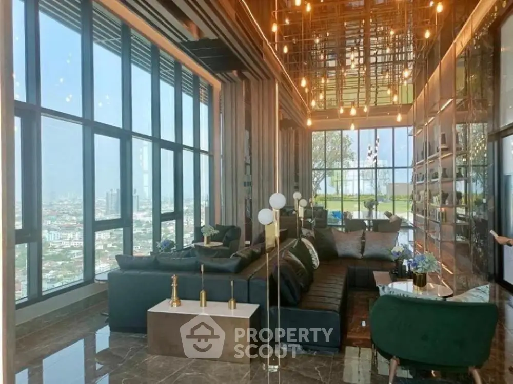 Luxurious high-rise living room with panoramic city views and elegant decor.