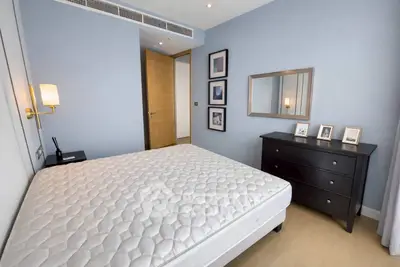 Modern bedroom with minimalist decor and stylish furniture