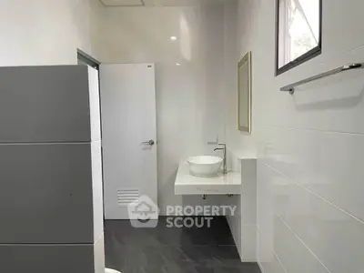 Modern bathroom with sleek design and white fixtures