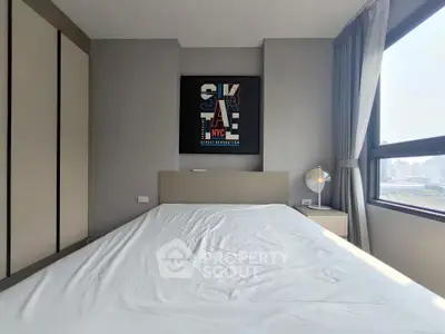 Modern bedroom with city view and stylish decor