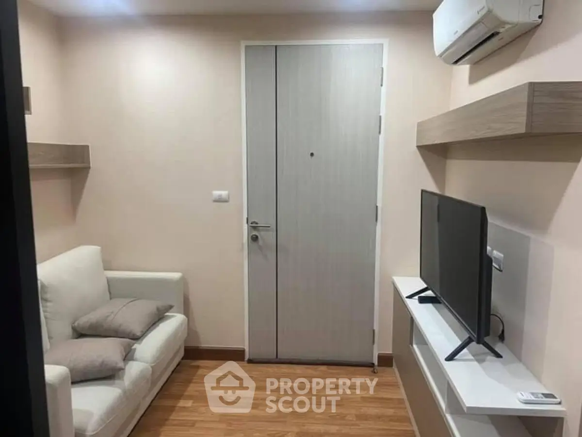 Cozy living room with modern decor and air conditioning