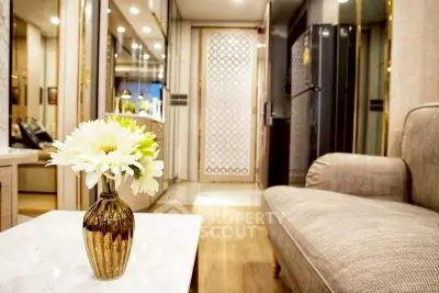 Elegant living room with cozy sofa and stylish decor in modern apartment.