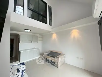 Modern loft apartment with high ceilings and sleek interior design