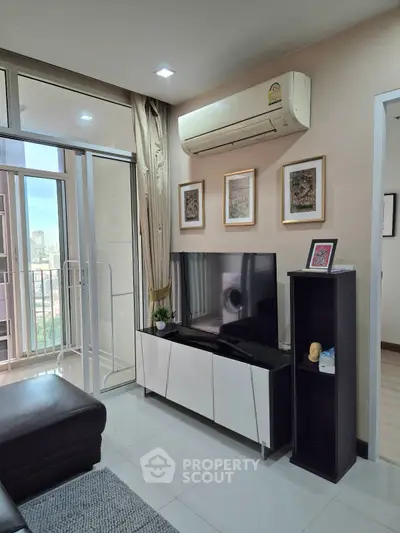 Modern living room with air conditioning and balcony view in a stylish apartment.