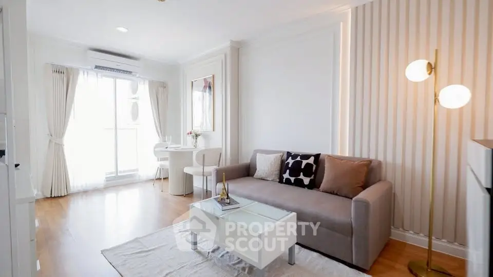 Elegant living room with modern decor and natural light