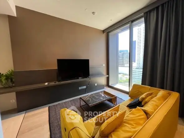 Modern living room with yellow sofa and large window offering city view