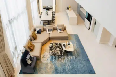 Luxurious modern living room with high ceilings and elegant decor