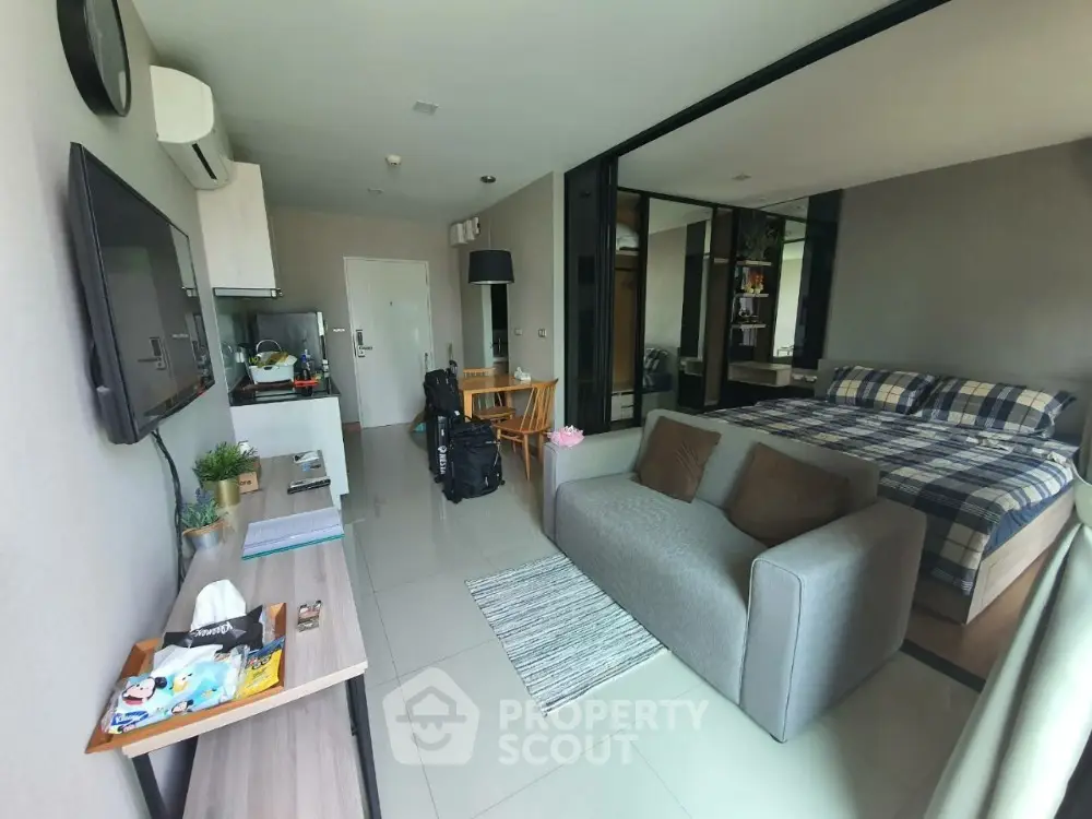 Modern studio apartment with open layout and stylish furnishings
