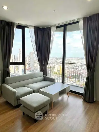 Modern living room with panoramic city view and stylish furniture