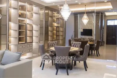 Luxurious dining room with elegant chandeliers and modern furnishings