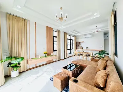 Spacious modern living room with elegant decor and natural light