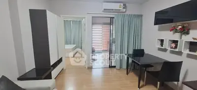 Modern living room with sleek furniture and open layout, featuring a stylish dining area and natural light.