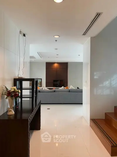 Spacious modern living room with elegant decor and comfortable seating