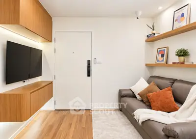 Modern living room with sleek wooden cabinets and cozy sofa, perfect for urban living.