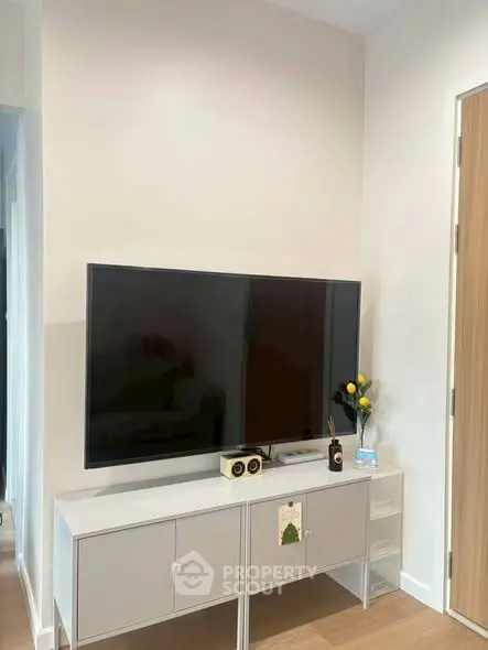 Modern living room with sleek TV setup and stylish decor