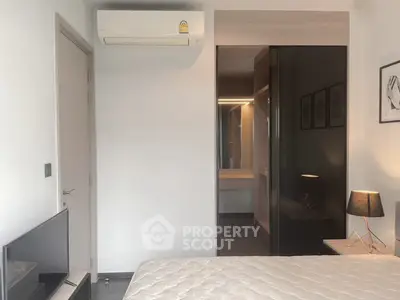 Modern bedroom with air conditioning and sleek design