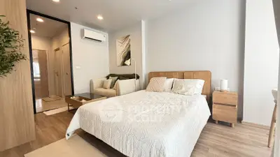 Modern bedroom with cozy decor and natural light