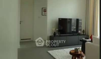 Modern living room with sleek TV setup and stylish decor