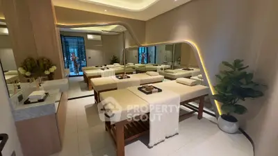 Luxurious spa room with elegant massage tables and ambient lighting