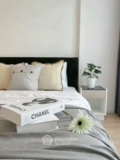 Elegant bedroom with stylish decor and cozy bedding, perfect for relaxation.