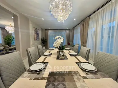 Elegant dining room with luxurious chandelier and modern decor