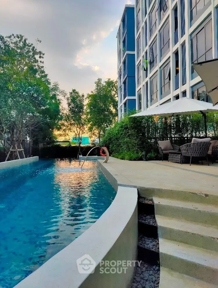 Luxurious condo with stunning poolside view and modern architecture