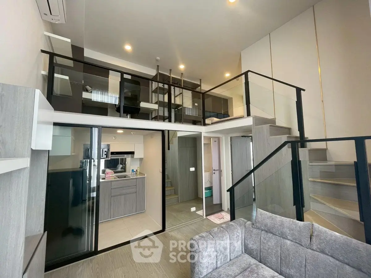 Modern loft apartment with open kitchen and stylish mezzanine