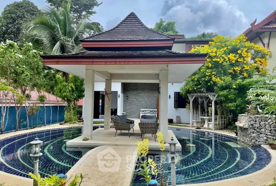 Stunning tropical villa with pool and lush garden, perfect for luxurious living.