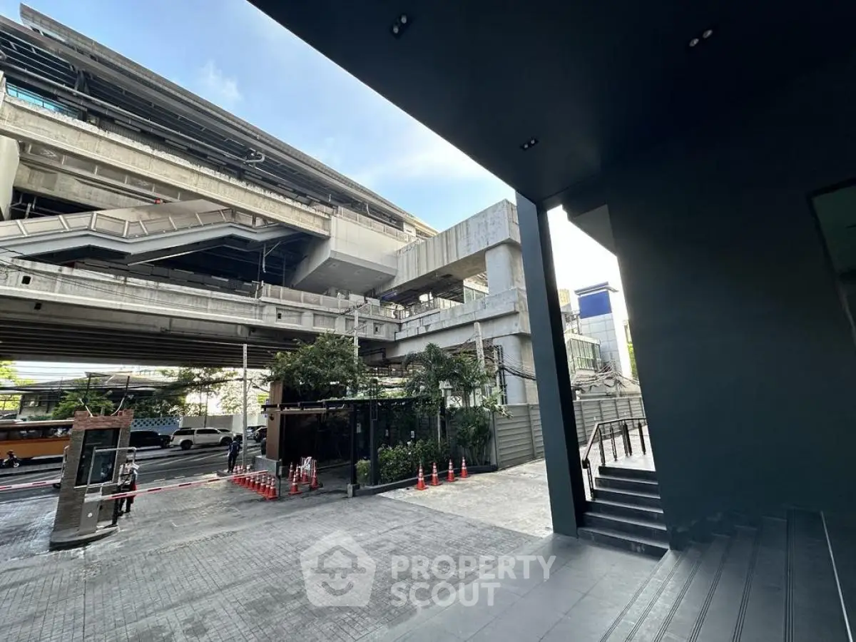 Modern urban exterior with concrete structures and street view