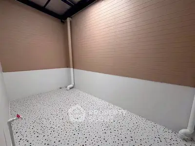 Spacious storage room with modern design and terrazzo flooring