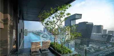 Luxurious high-rise balcony with stunning cityscape view and infinity pool, perfect for urban living.