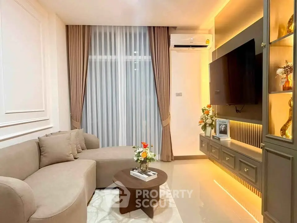 Modern living room with elegant decor and cozy seating area