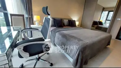 Modern bedroom with sleek design and ergonomic chair