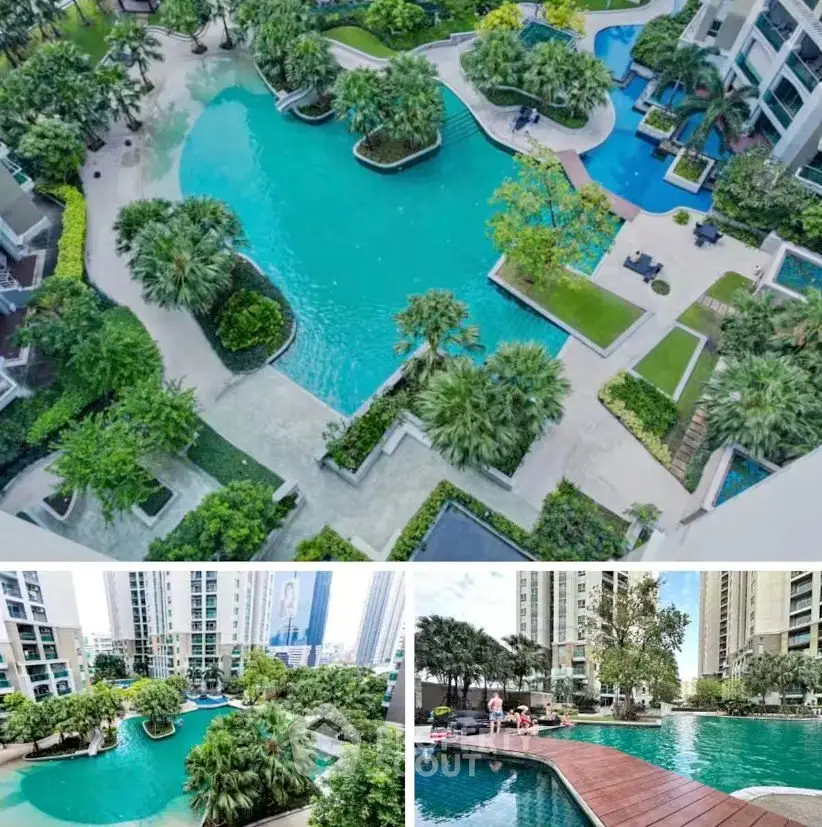 Luxurious residential complex with stunning pool and lush greenery